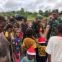 Keceriaan Anak anak Terima Bingkisan Natal dari Kodim Yahukimo