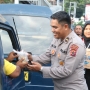 Semarak Ramadhan, Duta Humas Polda Papua dan Insan Pers Turun ke Jalan Berbagi Takjil