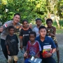 Ops Damai Cartenz-2025 Berbagi Buku dan Keceriaan Bersama Anak-anak di Mimika